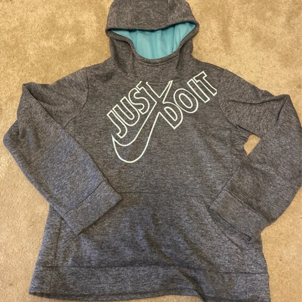 grey and teal Nike hoodie in size medium